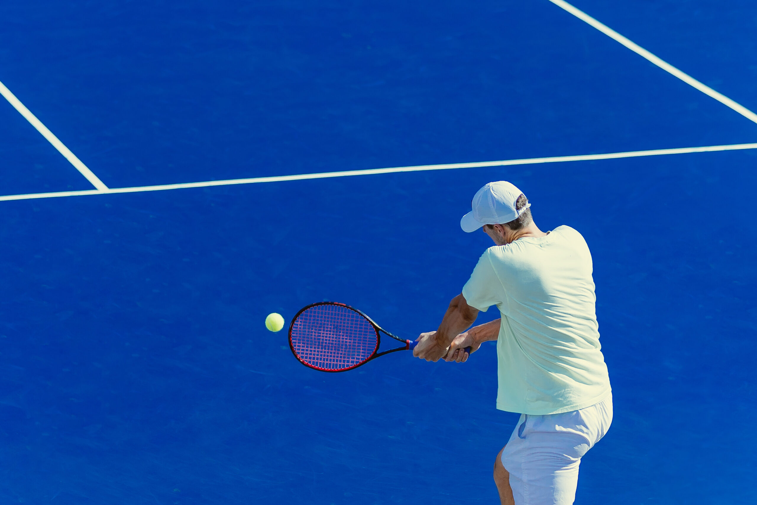 tennis player on blue court